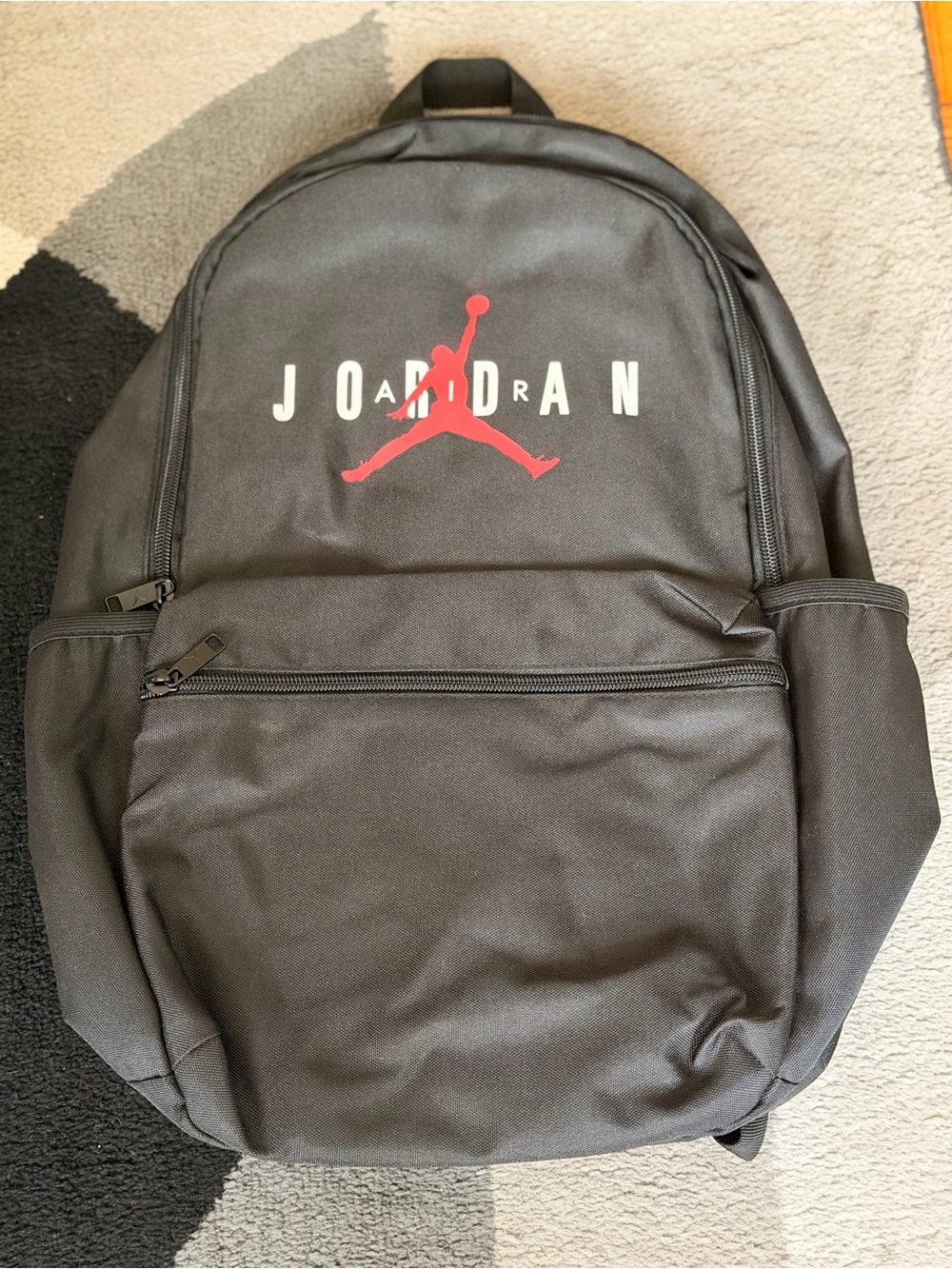 Jordan Black Backpack with Red Jumpman and White Lettering